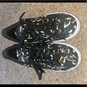 Adidas black butterfly print sneakers.